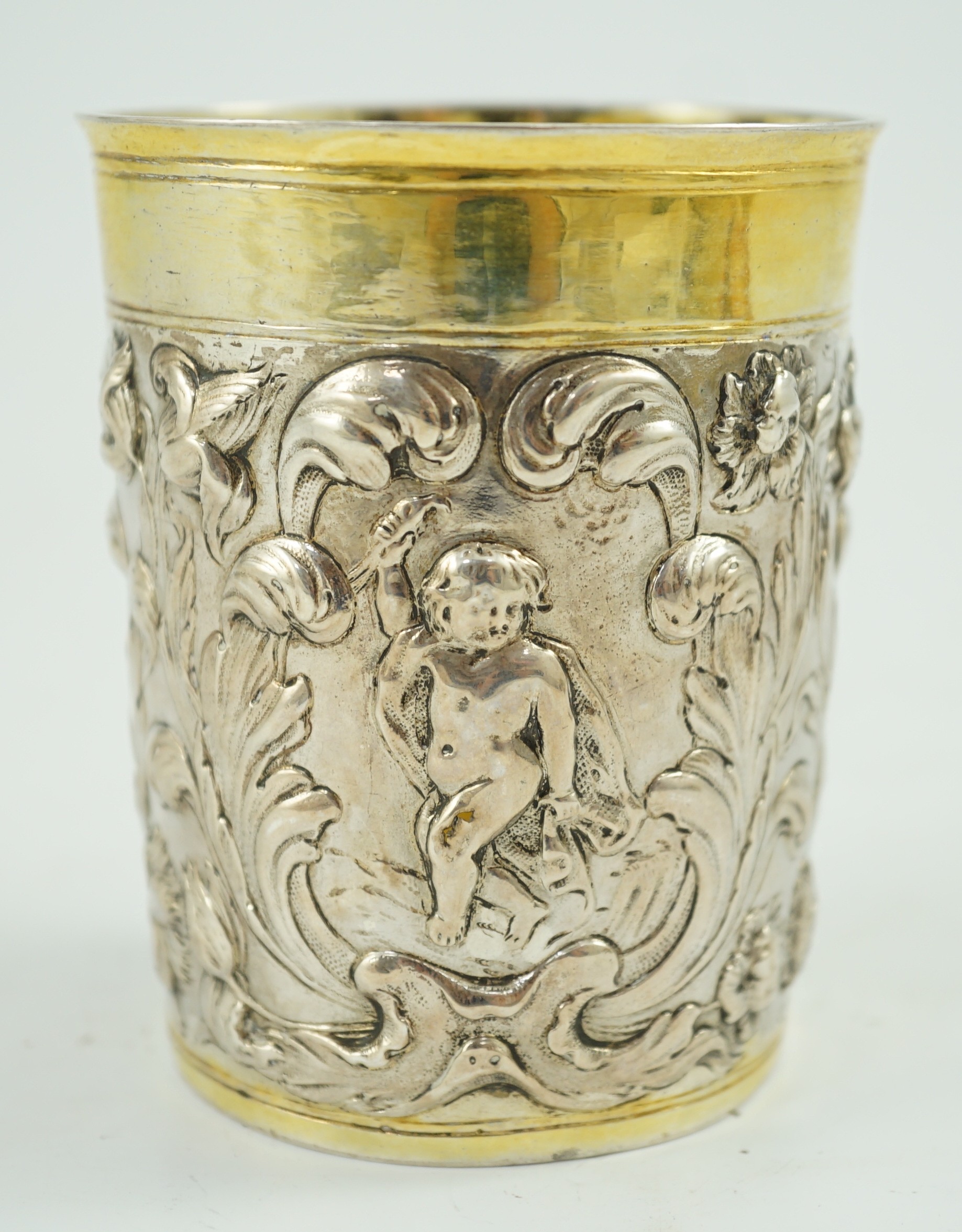 A late 18th century German embossed parcel gilt silver beaker, maker SBF